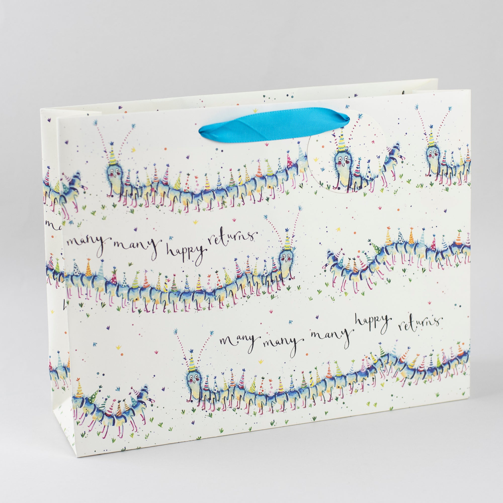 Image of illustrated centipede birthday gift bag with the caption Many Many Happy Returns