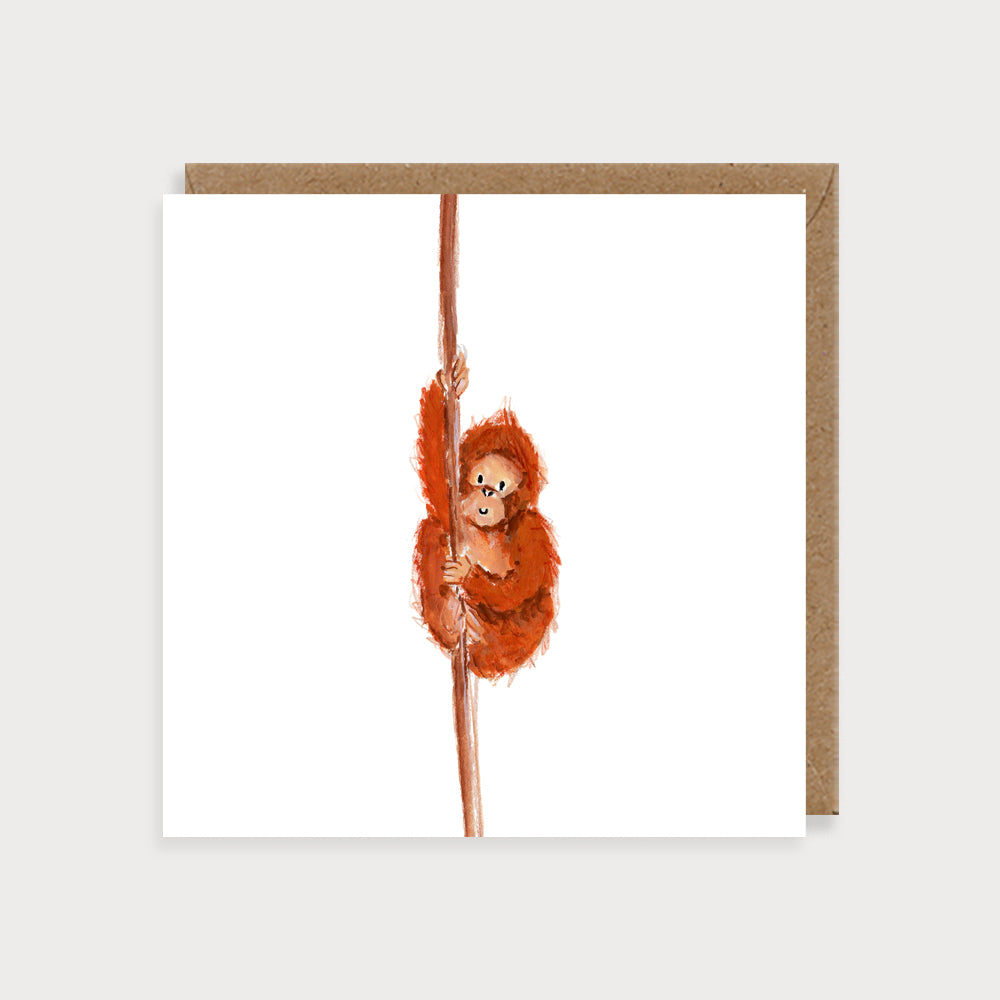 Image of illustrated card with a baby orangutan on a branch with no caption