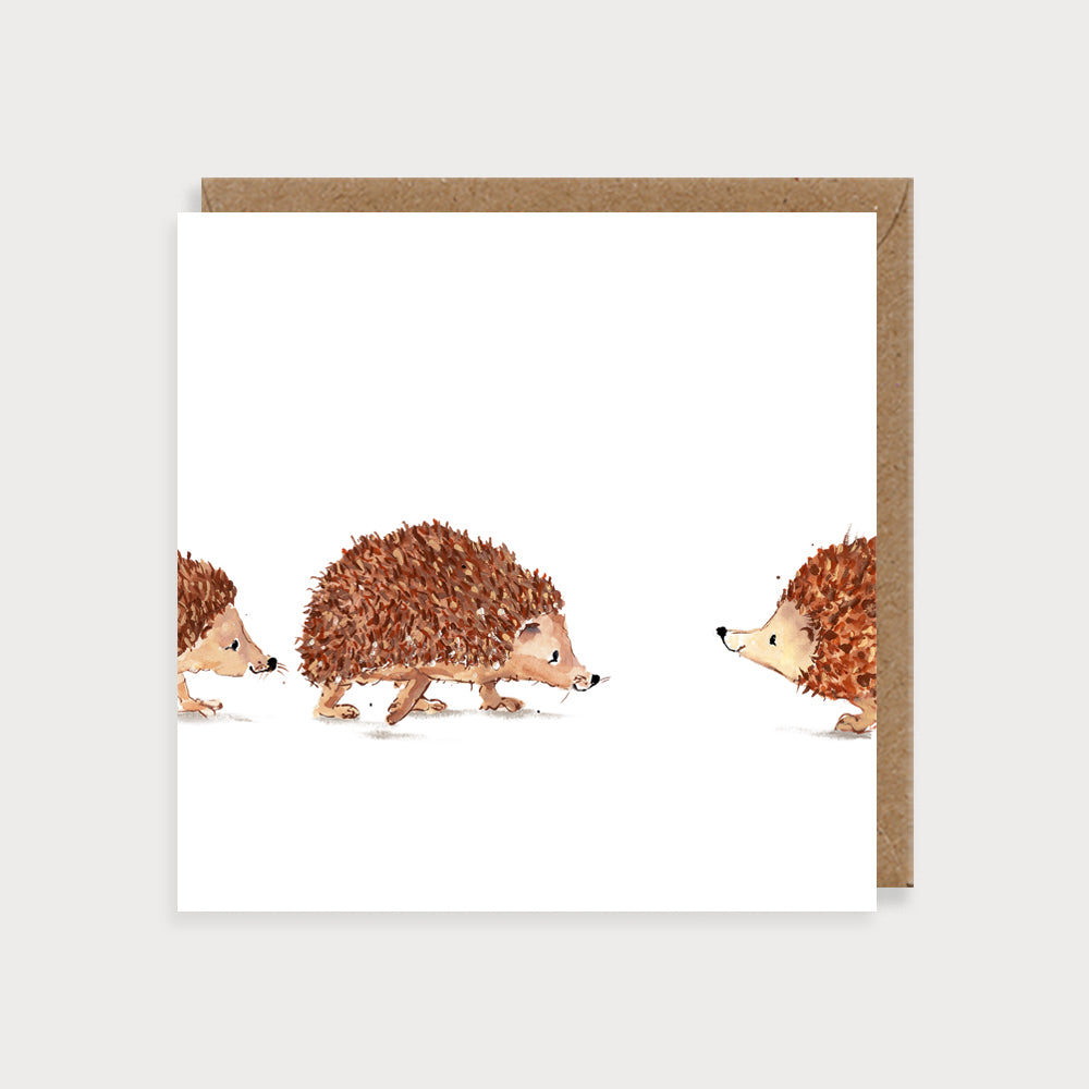 Image of illustrated card with three hedgehogs with no caption