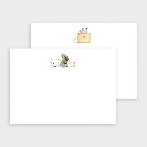 Image of illustrated notecard set with one bunny and flower design and a separate mouse holding an envelope design