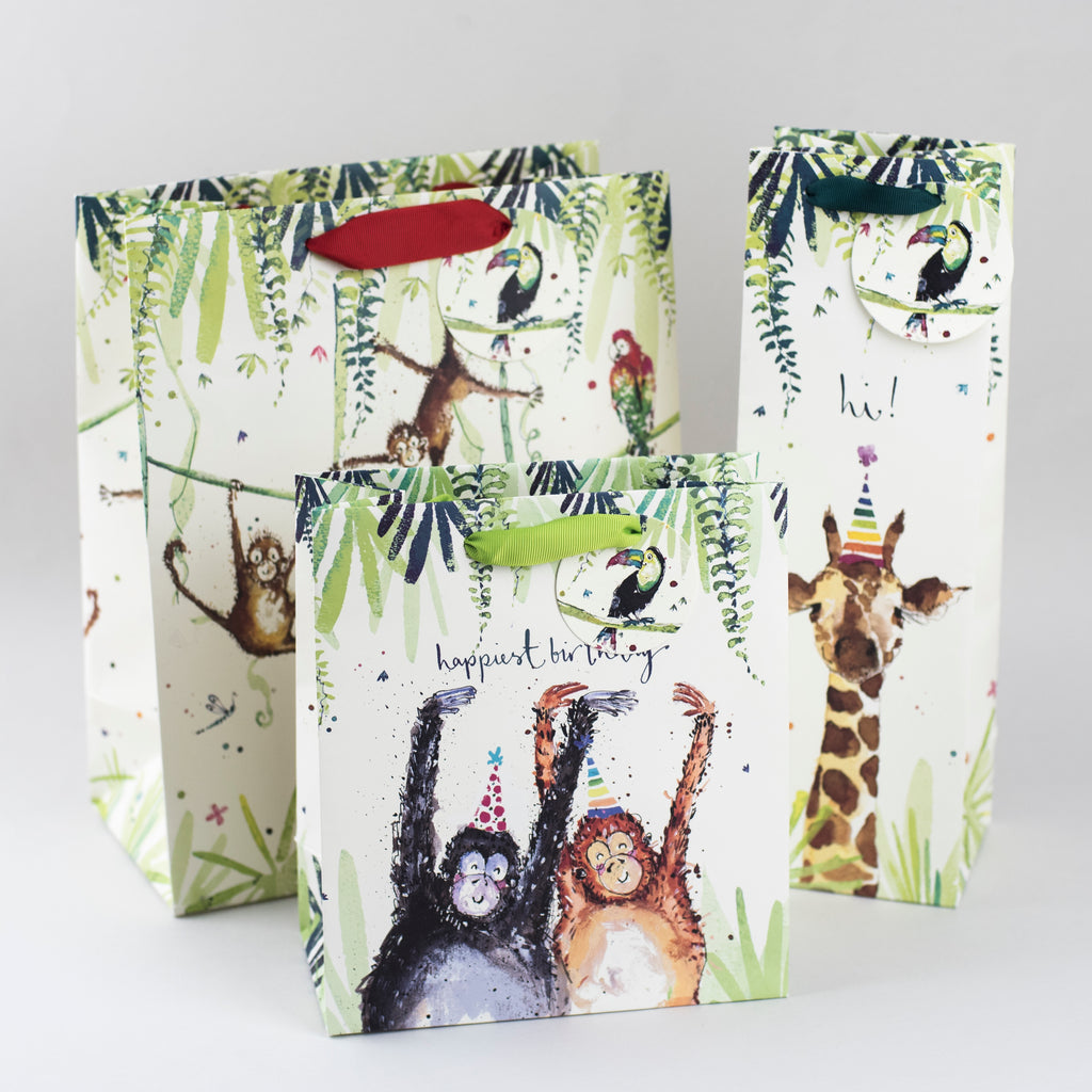 Image of illustrated jungle themed birthday gift bags with the caption Happiest Birthday