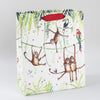 Image of illustrated jungle monkey themed birthday gift bag