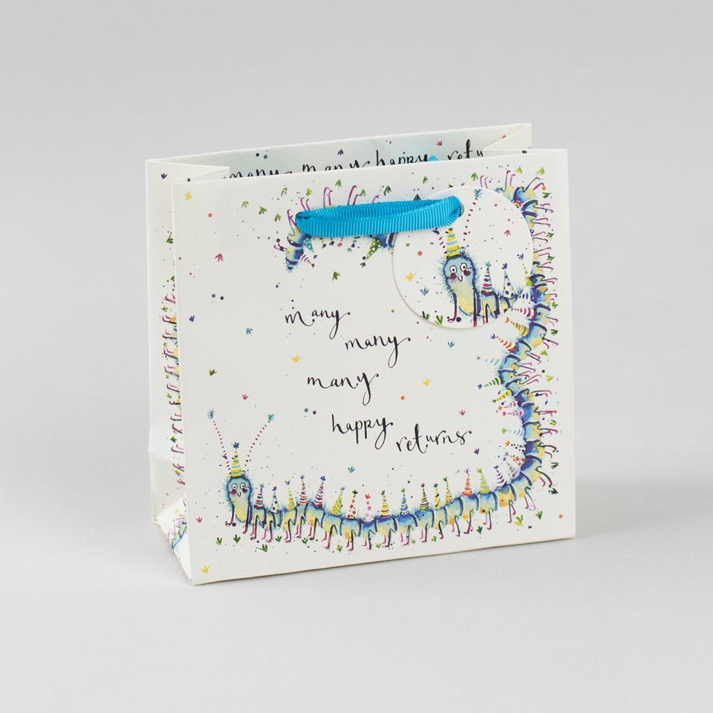 Image of illustrated centipede birthday gift bag with the caption Many Many Happy Returns