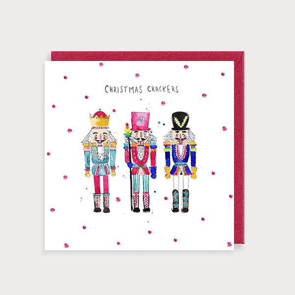Image of illustrated christmas card with 3 nutcrackers and the caption Christmas Crackers