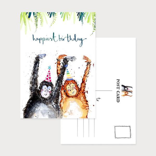 Image of an illustrated portrait postcard with 2 monkeys in party hats and their arms in the air with the caption Happiest Birthday