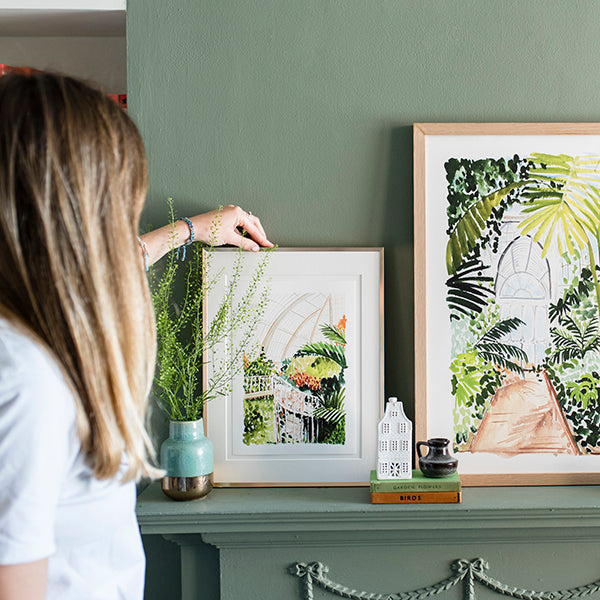 Image of illustrated palm house interior in a frame