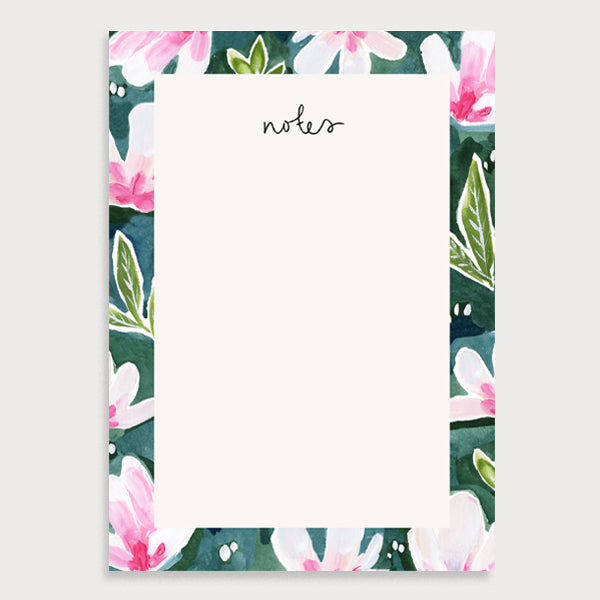 Image of an illustrated A5 notepad with a magnolia border the title notes