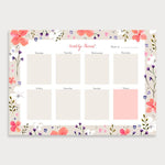 Image of illustrated weekly planner pad with a coral coloured floral border. It has a title of Weekly Planner and has seperate boxes for the days of the week and a note section