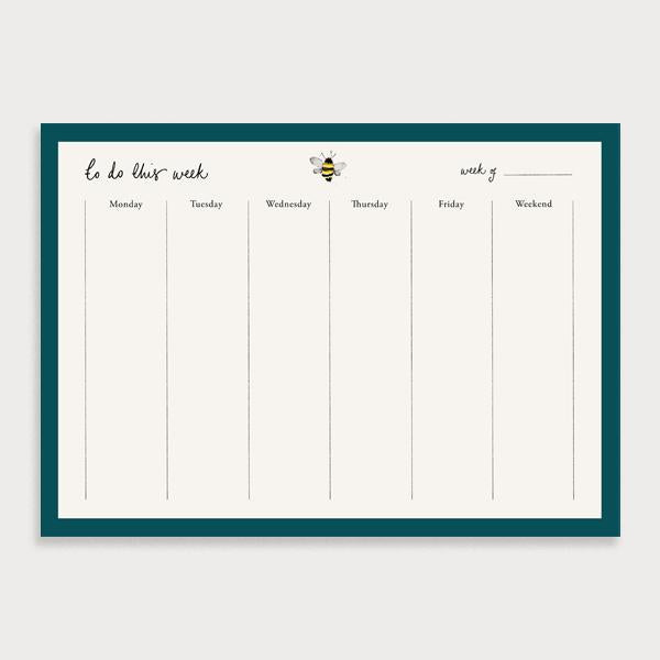 Image of illustrated weekly planner pad with a dark teal border and a bee at the top of the page. It has a title of To Do This Week and has seperate boxes for the days of the week and a note section
