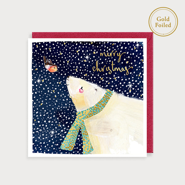 Image of illustrated foiled christmas card with a polar bear and a robin and the caption merry christmas