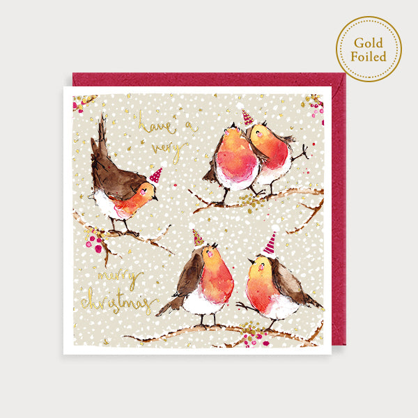 Image of illustrated foiled christmas card with robins on twigs and the caption have a very merry christmas